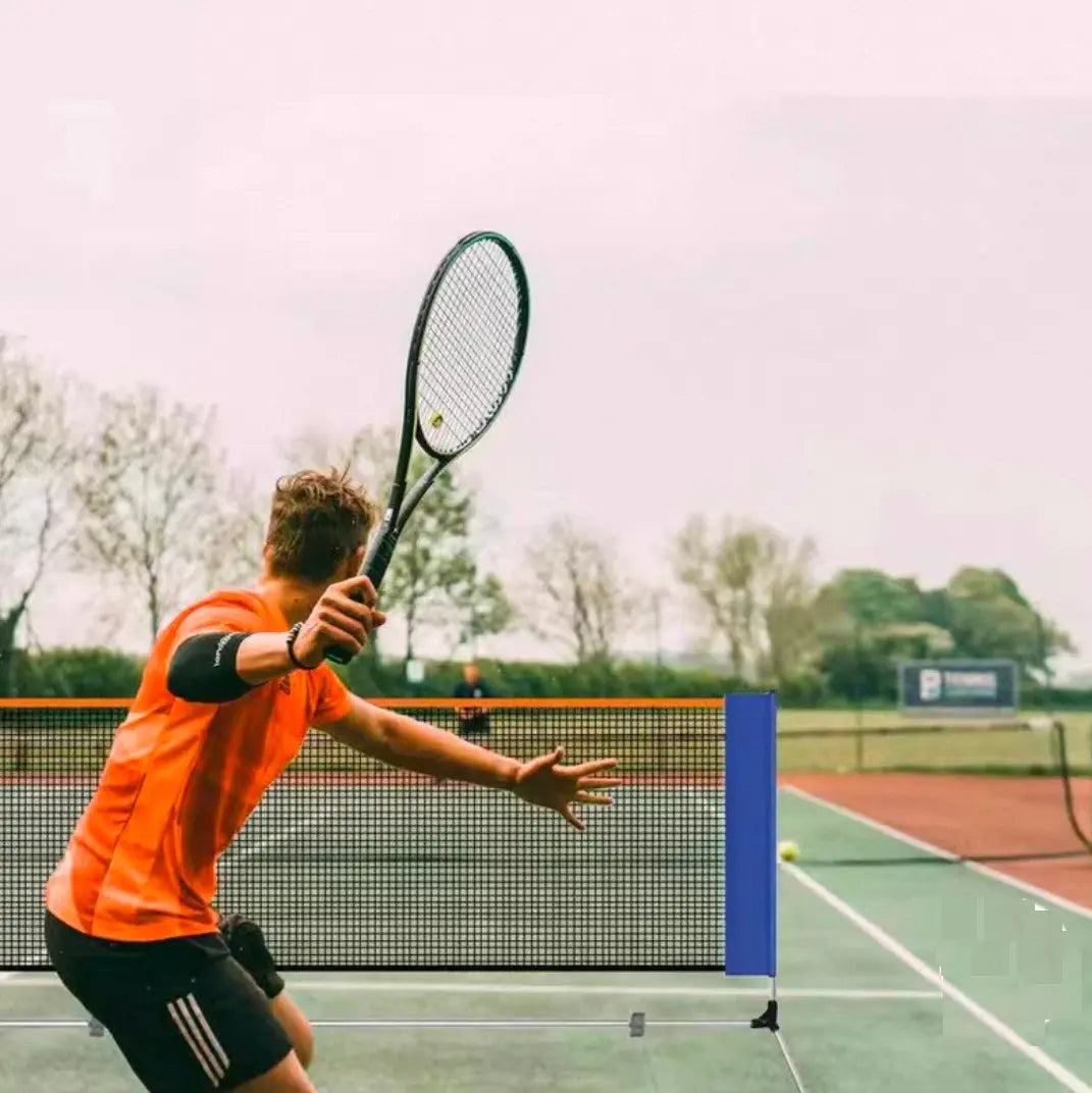 Athlete holding a pickleball paddle, swinging on a pickleball court during a match