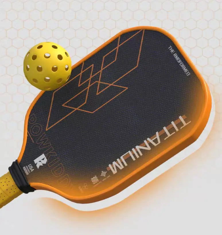 Close-up of a pickleball paddle with textured matte surface