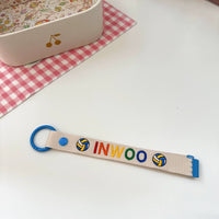 blue pique racket embroidered pendant